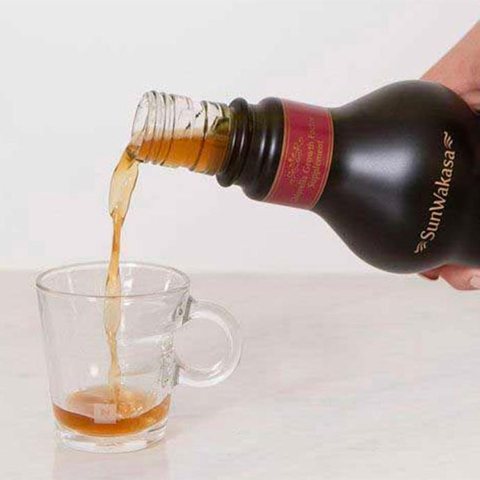 Sun Wakasa Gold Plus pouring into a glass cup