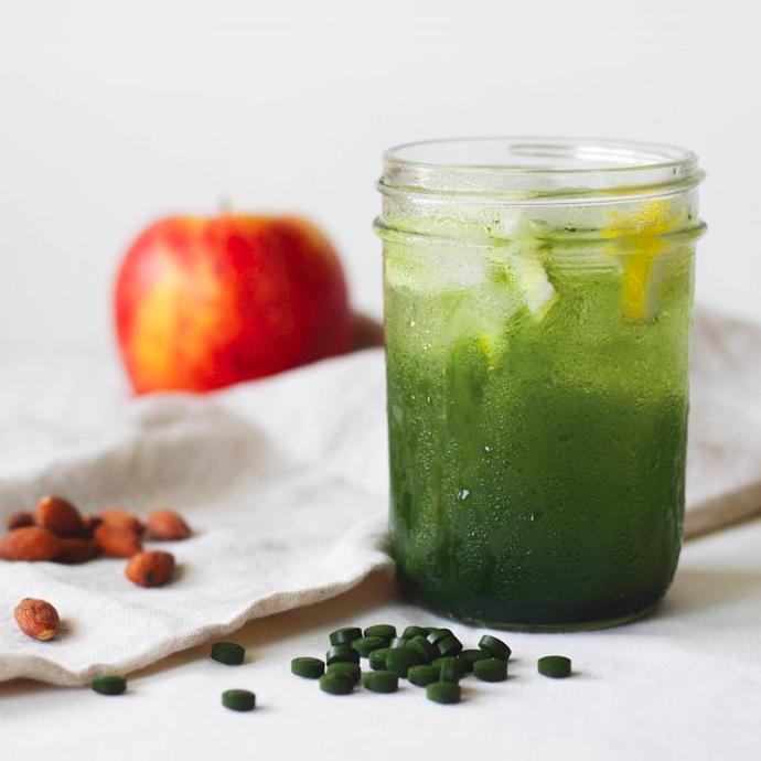 Chlorella powder mixed beverage in a glass jar