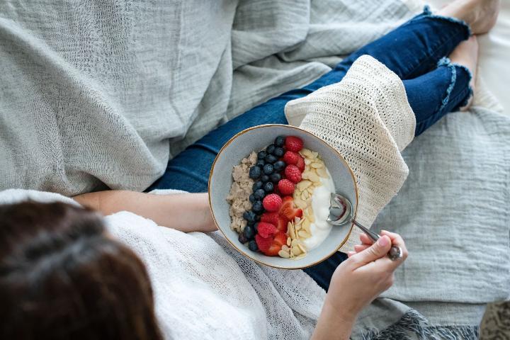 Woman eating parfait