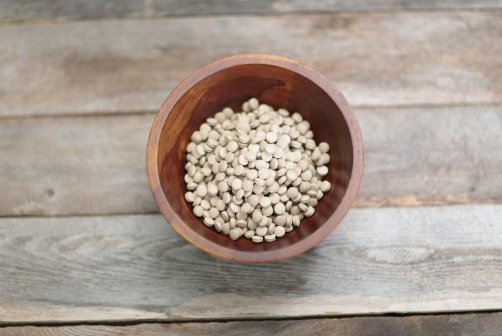 Ginseng tablets in a bowl