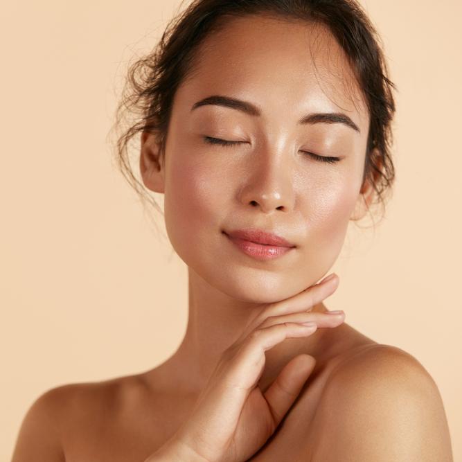 Woman with her head over her shoulder posing